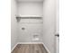 Laundry room with shelving and built-in utility niche at 16930 Cole Evans Dr, Noblesville, IN 46060