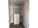 Organized closet with black hardware, shelving, and hanging rods at 2426 S Holt S Rd, Indianapolis, IN 46241