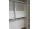 Spacious walk-in closet provides ample storage with adjustable shelving and hanging rods at 2426 S Holt S Rd, Indianapolis, IN 46241