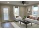 Inviting living room filled with natural light, plush seating, and modern decor at 2426 S Holt S Rd, Indianapolis, IN 46241