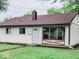 Cute ranch home with brown roof and vinyl siding at 2704 Seminole Dr, Anderson, IN 46012