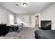 Neutral bedroom with two beds and a large window at 3356 N Park Ave, Indianapolis, IN 46205