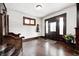 Inviting foyer with wood floors, stylish decor, and a view of the staircase at 3356 N Park Ave, Indianapolis, IN 46205