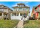 Two-story home with a covered front porch and well-maintained lawn at 3356 N Park Ave, Indianapolis, IN 46205