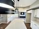 Modern kitchen with white cabinets and pendant lighting at 337 N Beville Ave, Indianapolis, IN 46201