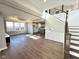 Spacious living room with hardwood floors, high ceilings, and an open floor plan at 337 N Beville Ave, Indianapolis, IN 46201