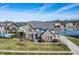 Aerial view of a suburban home featuring water views and surrounding neighborhood at 377 Morningside Dr, Brownsburg, IN 46112