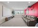 Finished basement with a projector screen and brown leather seating at 377 Morningside Dr, Brownsburg, IN 46112