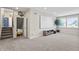 Finished basement with home theater setup and stairway to another level at 377 Morningside Dr, Brownsburg, IN 46112
