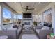 Relax in style on this covered patio complete with fireplace, and ceiling fan at 377 Morningside Dr, Brownsburg, IN 46112