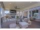 Relax in style on this covered patio complete with fireplace, and ceiling fan at 377 Morningside Dr, Brownsburg, IN 46112
