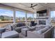 Relax in style on this covered patio complete with fireplace, and ceiling fan at 377 Morningside Dr, Brownsburg, IN 46112