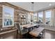 Charming dining room with wood paneled accent wall and natural light at 377 Morningside Dr, Brownsburg, IN 46112