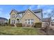 Two-story home with brick and stone accents, a manicured lawn, and a well-maintained yard at 377 Morningside Dr, Brownsburg, IN 46112