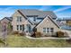 Charming two-story home with brick and stone accents, a manicured lawn, and a welcoming front entrance at 377 Morningside Dr, Brownsburg, IN 46112