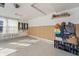Clean garage with epoxy flooring, built in wall organizer and plenty of natural light at 377 Morningside Dr, Brownsburg, IN 46112