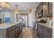 Granite countertops and stainless steel appliances highlight this beautifully designed kitchen at 377 Morningside Dr, Brownsburg, IN 46112