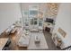 Aerial view of a well-lit living room with fireplace, and comfortable sofas at 377 Morningside Dr, Brownsburg, IN 46112