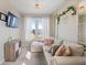 Comfortable living room features a cozy sectional sofa, and a window with nice view at 377 Morningside Dr, Brownsburg, IN 46112