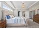 Well-lit main bedroom with a cozy bed, ensuite access, and ample space at 377 Morningside Dr, Brownsburg, IN 46112