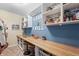 Versatile space features built-in shelving, a sturdy desk, and fun decorations at 377 Morningside Dr, Brownsburg, IN 46112