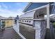 Outdoor kitchen with a built-in grill and a stone bar area for entertaining and enjoying outdoor cooking at 377 Morningside Dr, Brownsburg, IN 46112
