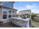 Outdoor kitchen with a grill, bar seating, and countertops perfect for outdoor entertaining and relaxing at 377 Morningside Dr, Brownsburg, IN 46112