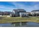 Beautiful home featuring a covered back porch and stunning water view at 377 Morningside Dr, Brownsburg, IN 46112