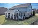 Beautiful home featuring a covered back porch, and outdoor grill at 377 Morningside Dr, Brownsburg, IN 46112