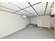 Basement with a gray painted floor and ceiling, and one window at 3910 E 34Th St, Indianapolis, IN 46218