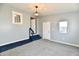 Bedroom with three windows, gray paint and gray carpeting at 3910 E 34Th St, Indianapolis, IN 46218
