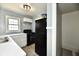 Kitchen featuring gas range, stainless steel sink and marbled countertops at 3910 E 34Th St, Indianapolis, IN 46218