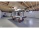 Finished basement game room with a pool table at 5324 Mann Rd, Indianapolis, IN 46221