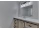 Modern bathroom with a stylish vanity and a large mirror at 5324 Mann Rd, Indianapolis, IN 46221