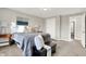 Charming bedroom with full bed, closet, and access to another room at 5704 E 16Th St, Indianapolis, IN 46218