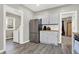 Modern kitchen with stainless steel appliances and wood countertops at 5704 E 16Th St, Indianapolis, IN 46218