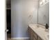 Double vanity bathroom with light wood cabinets at 6264 Whitaker Farms Dr, Indianapolis, IN 46237