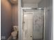 Bathroom with shower/tub combo and floral decor at 6264 Whitaker Farms Dr, Indianapolis, IN 46237