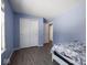 Bedroom with double bed, closet, and wood floor at 6264 Whitaker Farms Dr, Indianapolis, IN 46237