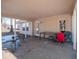 Covered patio with table, chairs, and access to the house at 6264 Whitaker Farms Dr, Indianapolis, IN 46237