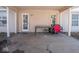 Covered patio with table and chairs, offering outdoor space at 6264 Whitaker Farms Dr, Indianapolis, IN 46237