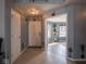 Inviting entryway with tile flooring and views into the sunroom at 6264 Whitaker Farms Dr, Indianapolis, IN 46237