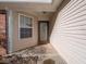 Covered entryway with a glass door at 6264 Whitaker Farms Dr, Indianapolis, IN 46237