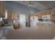 Functional kitchen with light wood cabinets and a stylish backsplash at 6264 Whitaker Farms Dr, Indianapolis, IN 46237