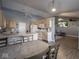 Eat-in kitchen with ample counter space and wood cabinets at 6264 Whitaker Farms Dr, Indianapolis, IN 46237