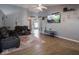 Bright living room with hardwood floors, recessed lighting, and comfortable seating at 6264 Whitaker Farms Dr, Indianapolis, IN 46237