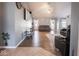 Spacious living room with wood-look floors and a ceiling fan at 6264 Whitaker Farms Dr, Indianapolis, IN 46237