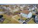 Aerial backyard featuring deck with seating, a hot tub, and a playground at 6623 Pasco Ln, Plainfield, IN 46168