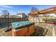 Backyard featuring a wooden deck and hot tub for relaxation, great for entertaining with a grill and outdoor activities at 6623 Pasco Ln, Plainfield, IN 46168