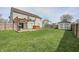 Spacious backyard featuring a shed, deck, hot tub and grill at 6623 Pasco Ln, Plainfield, IN 46168
